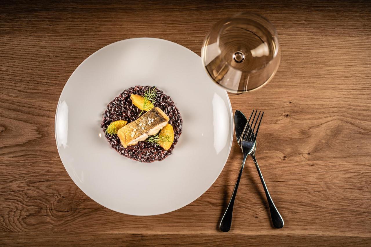 Hotel My Arbor - Dolomites Bressanone Esterno foto A plate of black rice risotto